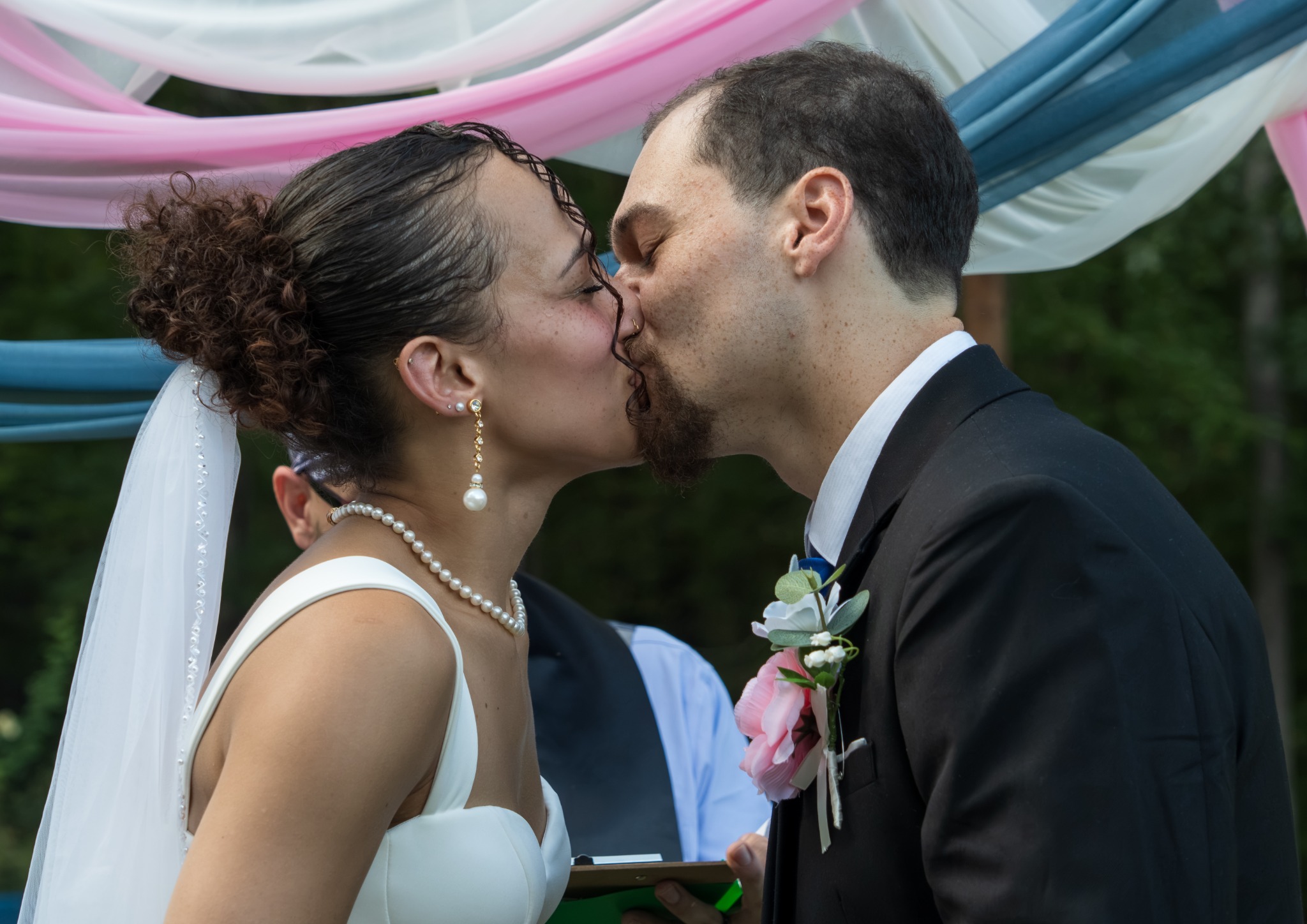 Bride and groom sharing a kiss