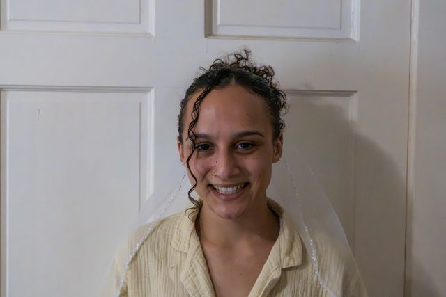 Bride smiling during wedding preparations