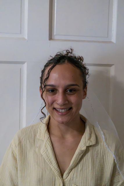 Bride smiling during wedding preparations