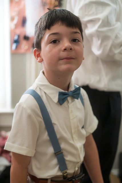Young guest dressed for the wedding