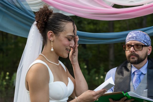 Bride during an emotional moment in the ceremony