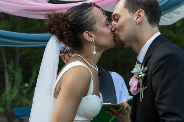 Bride and groom kissing