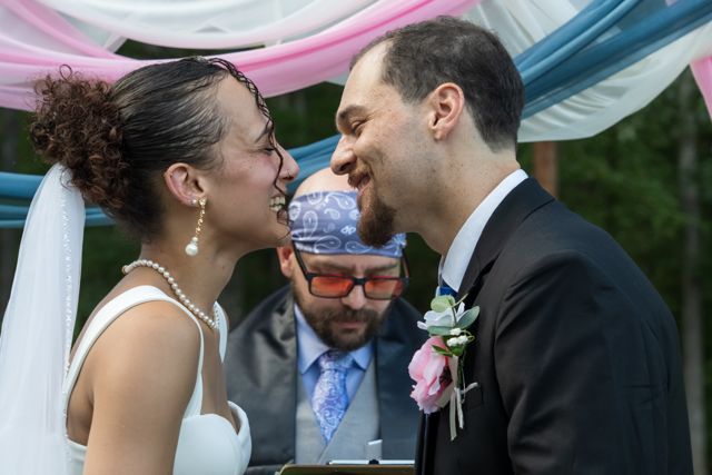 Bride and groom smiling together