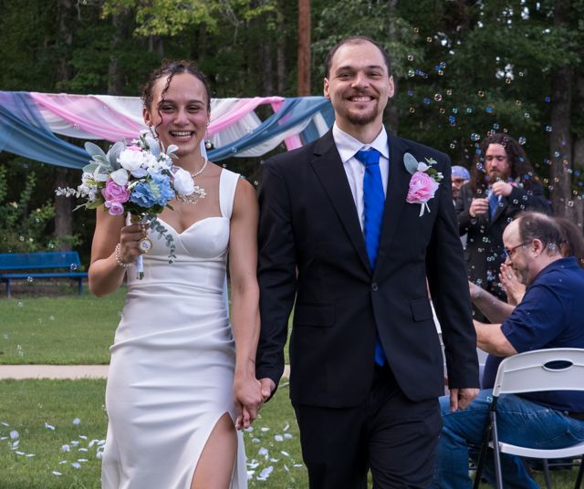 Newlyweds celebrating after the ceremony