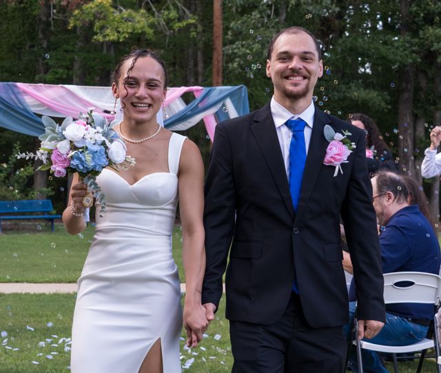 Newlyweds celebrating after the ceremony
