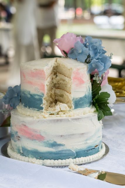 Flower-covered wedding cake