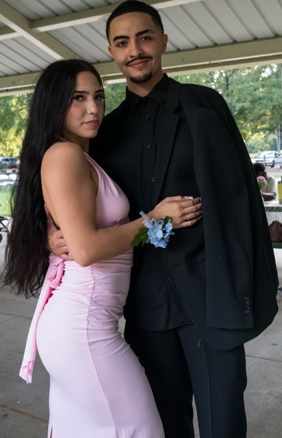 Couple posing together at the wedding