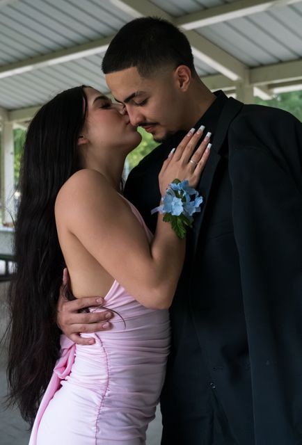 Couple posing together at the wedding