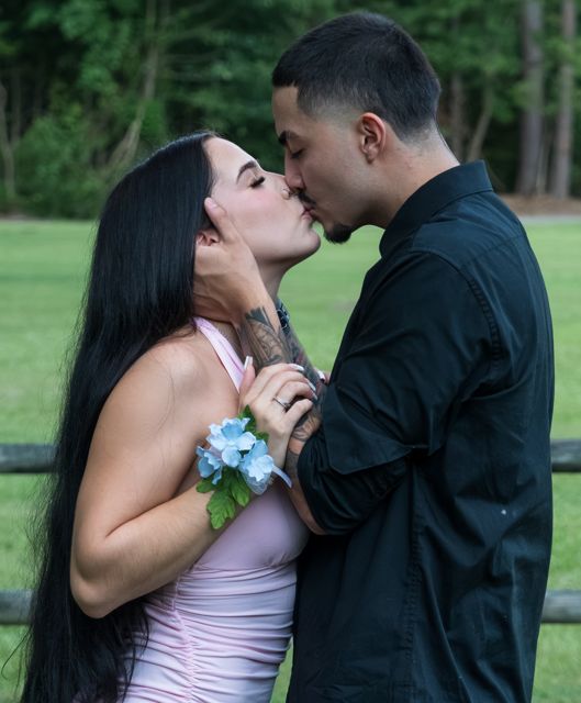 Couple posing together at the wedding