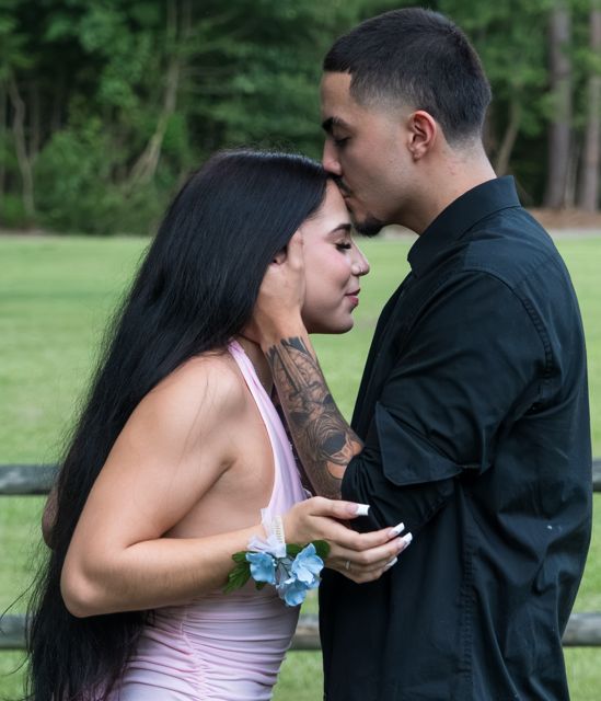 Couple posing together at the wedding