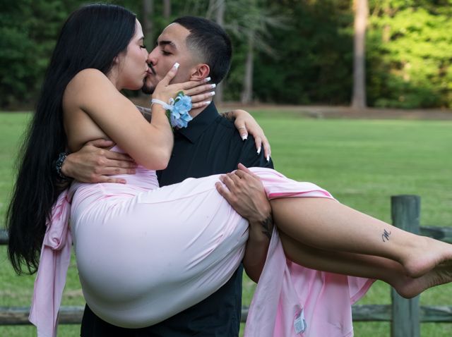 Playful couple portraits outdoors