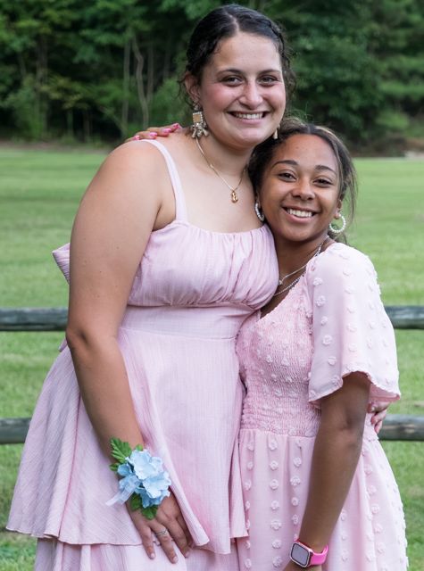 Wedding guests sharing a playful moment