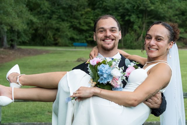 Bride carrying the groom