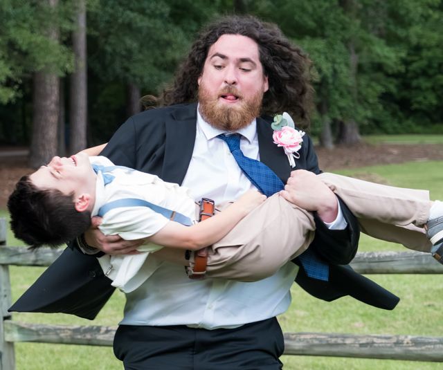Wedding guests posing playfully