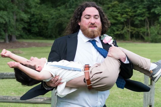 Wedding guests posing playfully